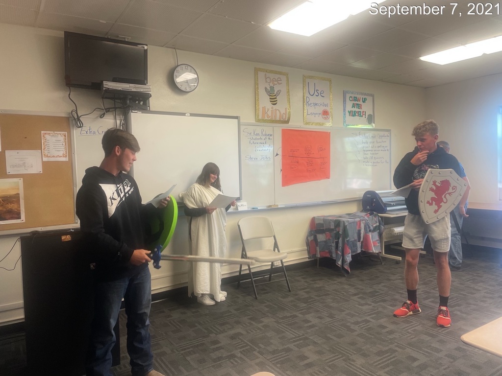 Students acting out scenes.